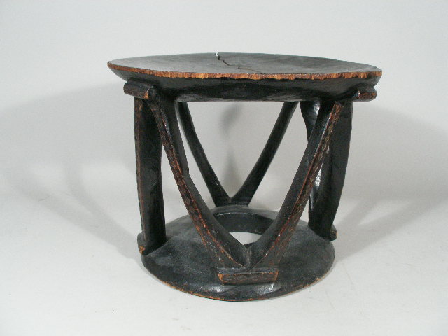 Appraisal: African Black Wood Drum-Shaped Throne the seat is a slightly