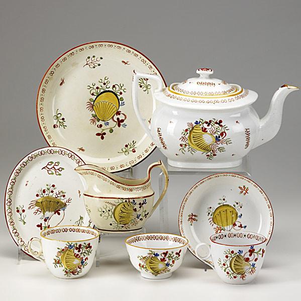 Appraisal: SOFT PASTE PORCELAIN TEA SETTwenty-three pieces include teapot cups saucers