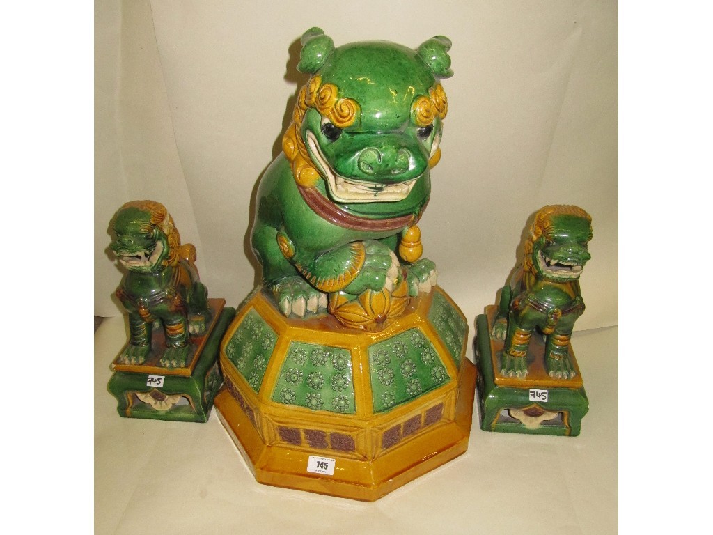 Appraisal: Large Chinese dog of fo figure and a pair of