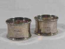 Appraisal: A pair of hallmarked silver napkin rings Sheffield circa