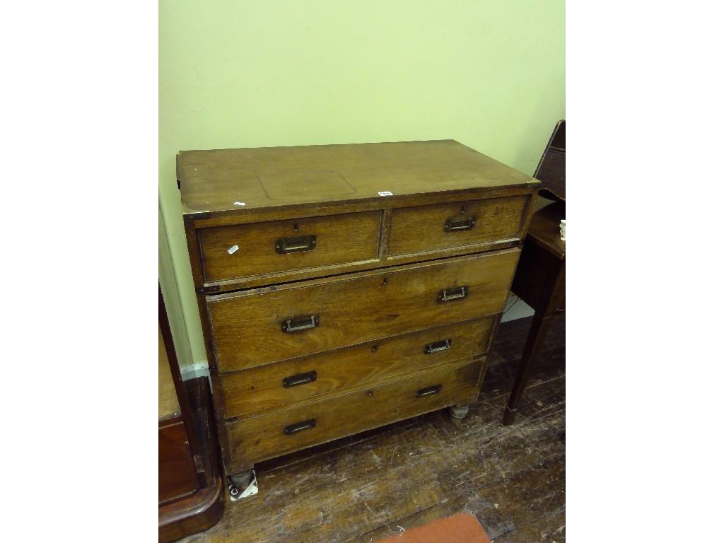 Appraisal: A th century mahogany two sectional campaign chest fitted with