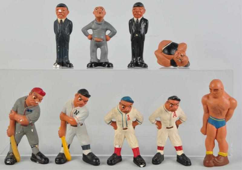 Appraisal: Lot of Composition Ruger Sports Figures Description Includes four baseball