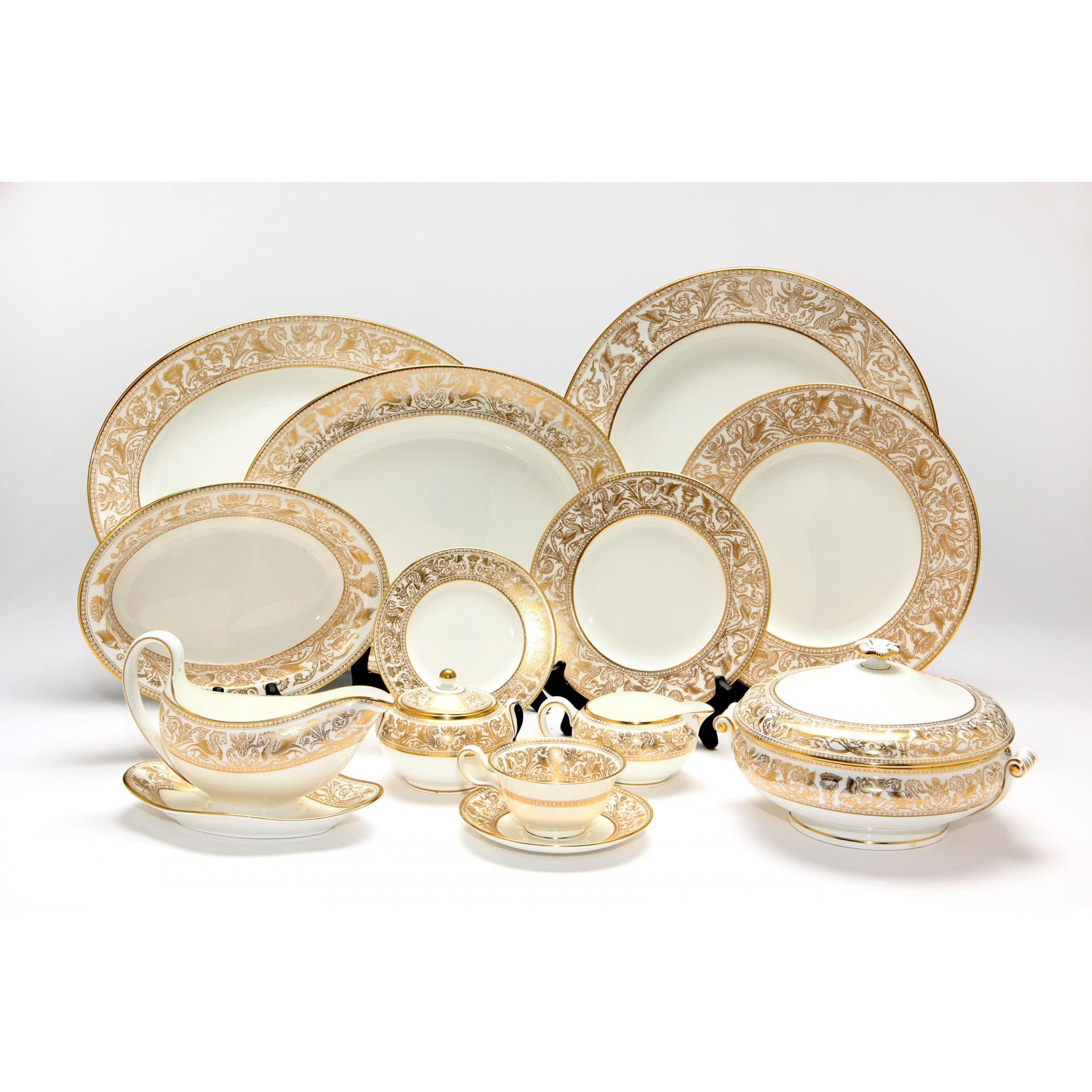 Appraisal: Wedgwood Florentine Porcelain Dinner Service in Gold pieces including dinner