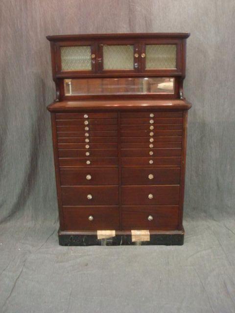 Appraisal: Art Deco Multi-Drawer Dental Cabinet with Glass Doors on Top