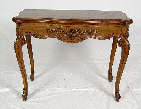 Appraisal: MID TH C CARVED EXTENSION TABLE Flip top foyer table