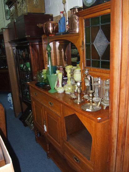 Appraisal: An Arts Crafts light oak sideboard with mirrored back and