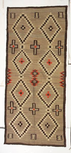 Appraisal: A Navajo runner Aligning two vertical rows of conjoined checkered