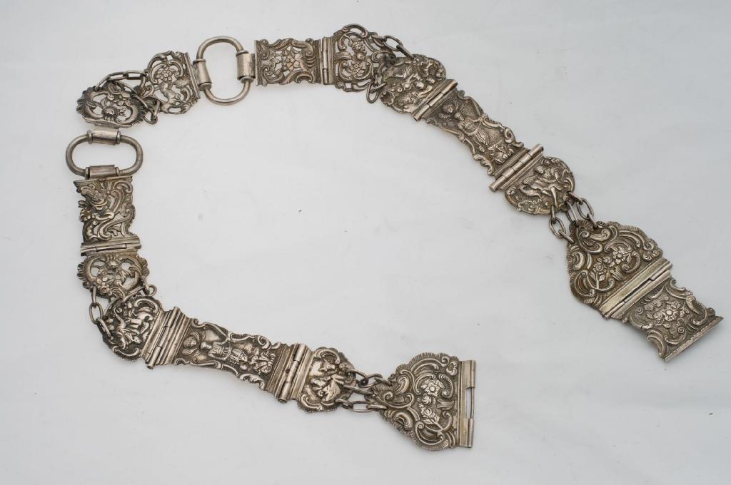 Appraisal: CONTINENTAL WHITE METAL BELT th CENTURY cast with figures of