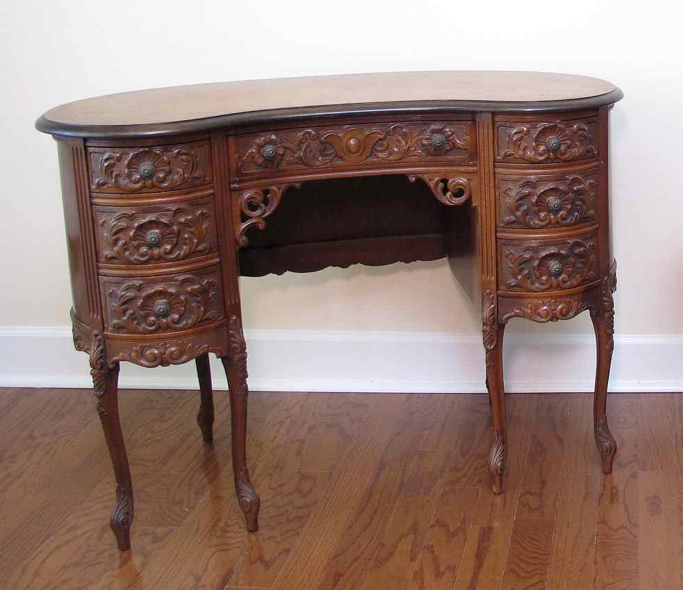 Appraisal: FRENCH CARVED KIDNEY SHAPE VANITY Shaped top with carved drawer