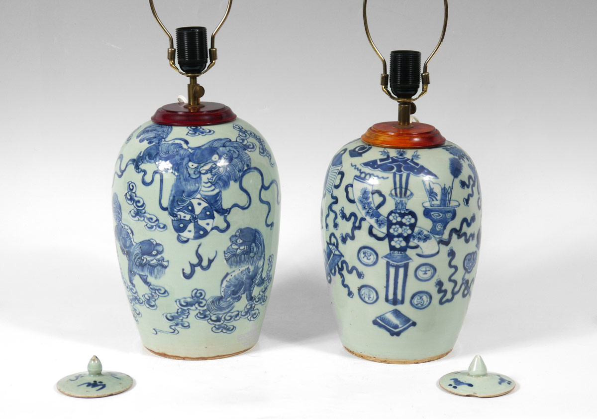 Appraisal: ASIAN EARTHENWARE BLUE UNDER GLAZE LAMPS Similar in shape to