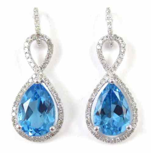 Appraisal: PAIR OF BLUE TOPAZ AND DIAMOND EARRINGS each k white