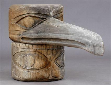 Appraisal: NORTHWEST COAST TOTEM POLE FRAGMENT Carved in parts of a