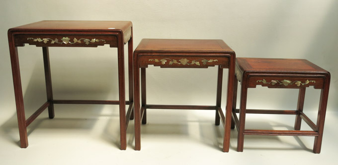 Appraisal: THREE CHINESE ROSEWOOD NESTING TABLES with mother of pearl inlay