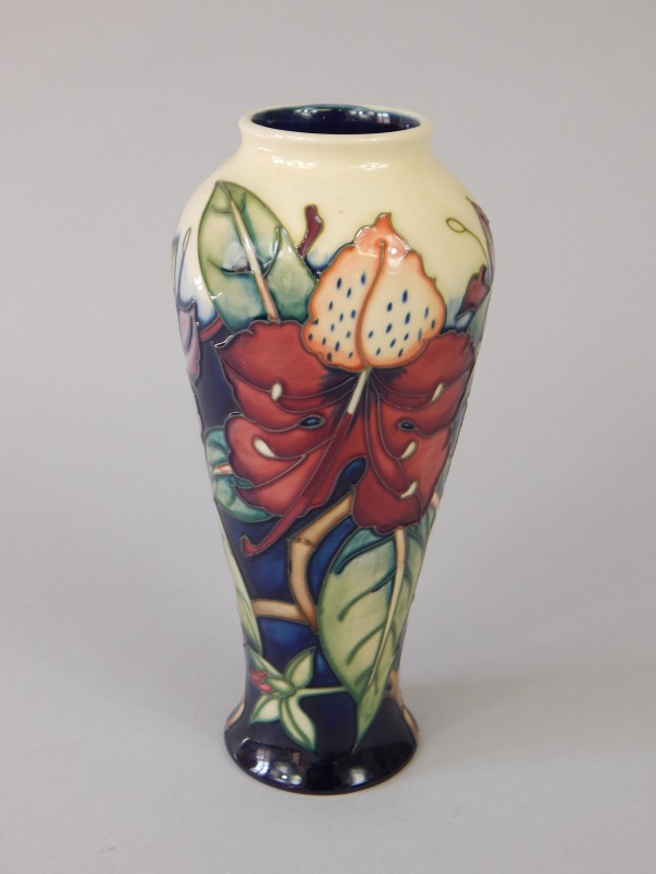 Appraisal: A Moorcroft baluster vase Fuchsia pattern various initials to underside