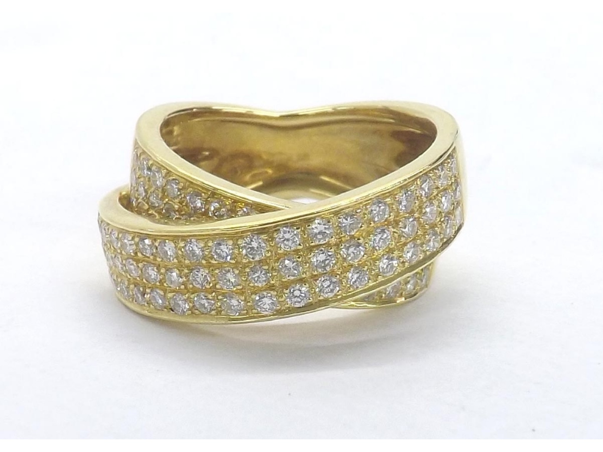 Appraisal: - -a Diamond set ct yellow gold crossover design ring