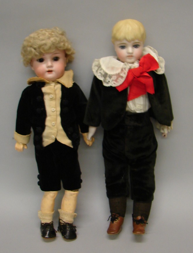 Appraisal: Pair of boy dolls dressed in vintage black velvet Little