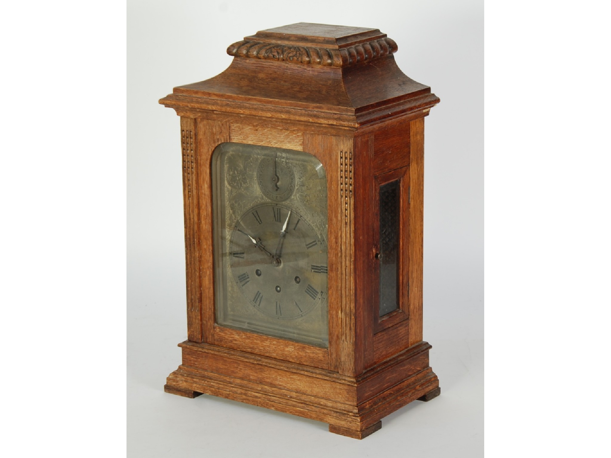 Appraisal: EARLY TWENTIETH CENTURY CARVED OAK MANTEL CLOCK by Gustav Becker