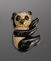 Appraisal: Kt Diamond Onyx Panda Brooch Kt yellow gold mounting with