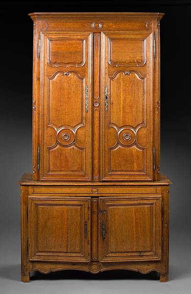 Appraisal: A Louis XV oak buffet a deux corps third quarter