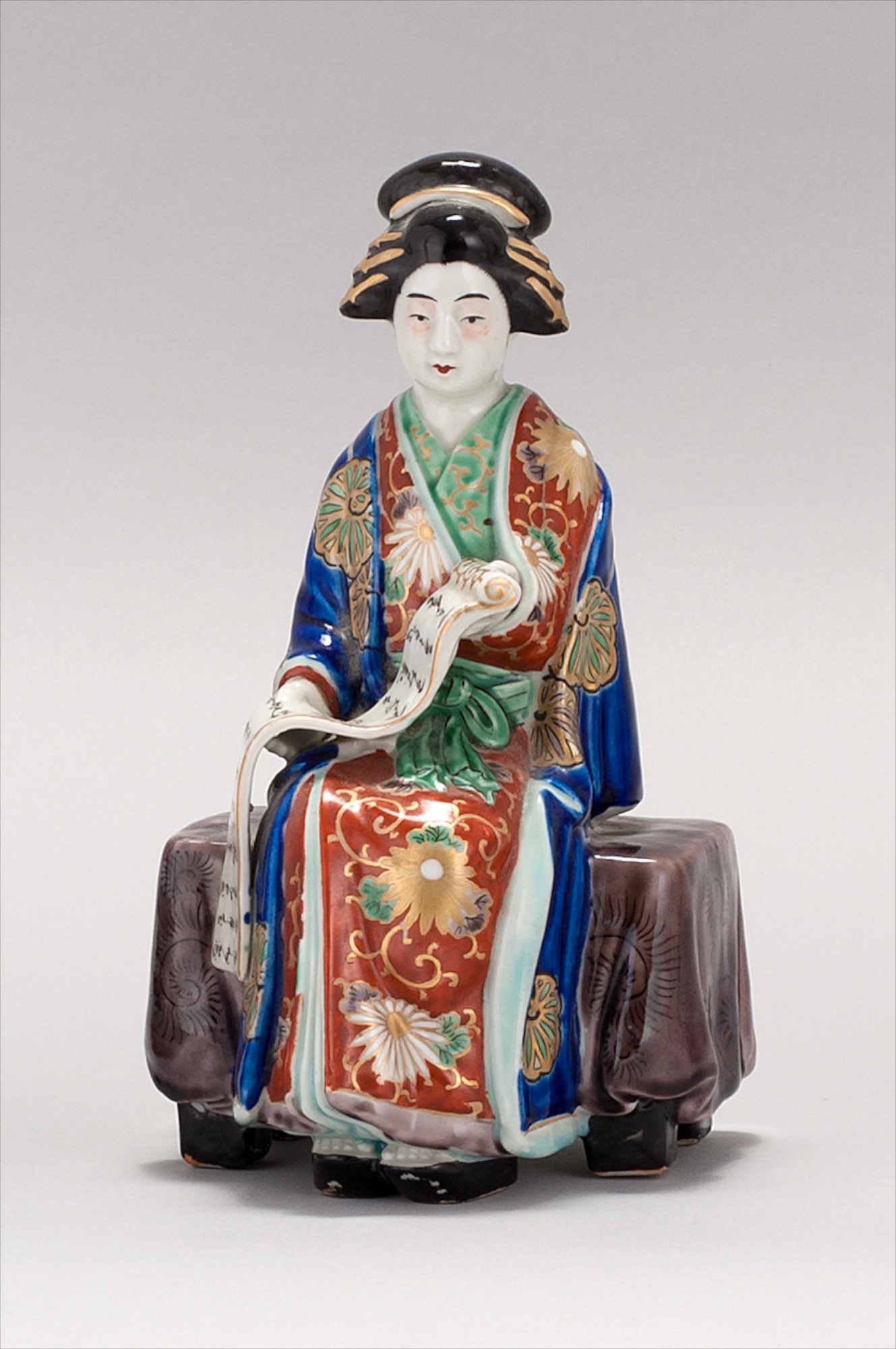 Appraisal: IMARI PORCELAIN FIGURE OF A BIJIN Meiji PeriodSeated on a