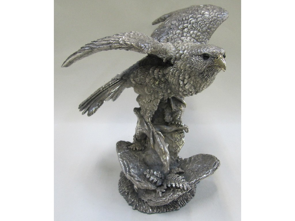 Appraisal: Sterling silver model of a bird of prey on stand