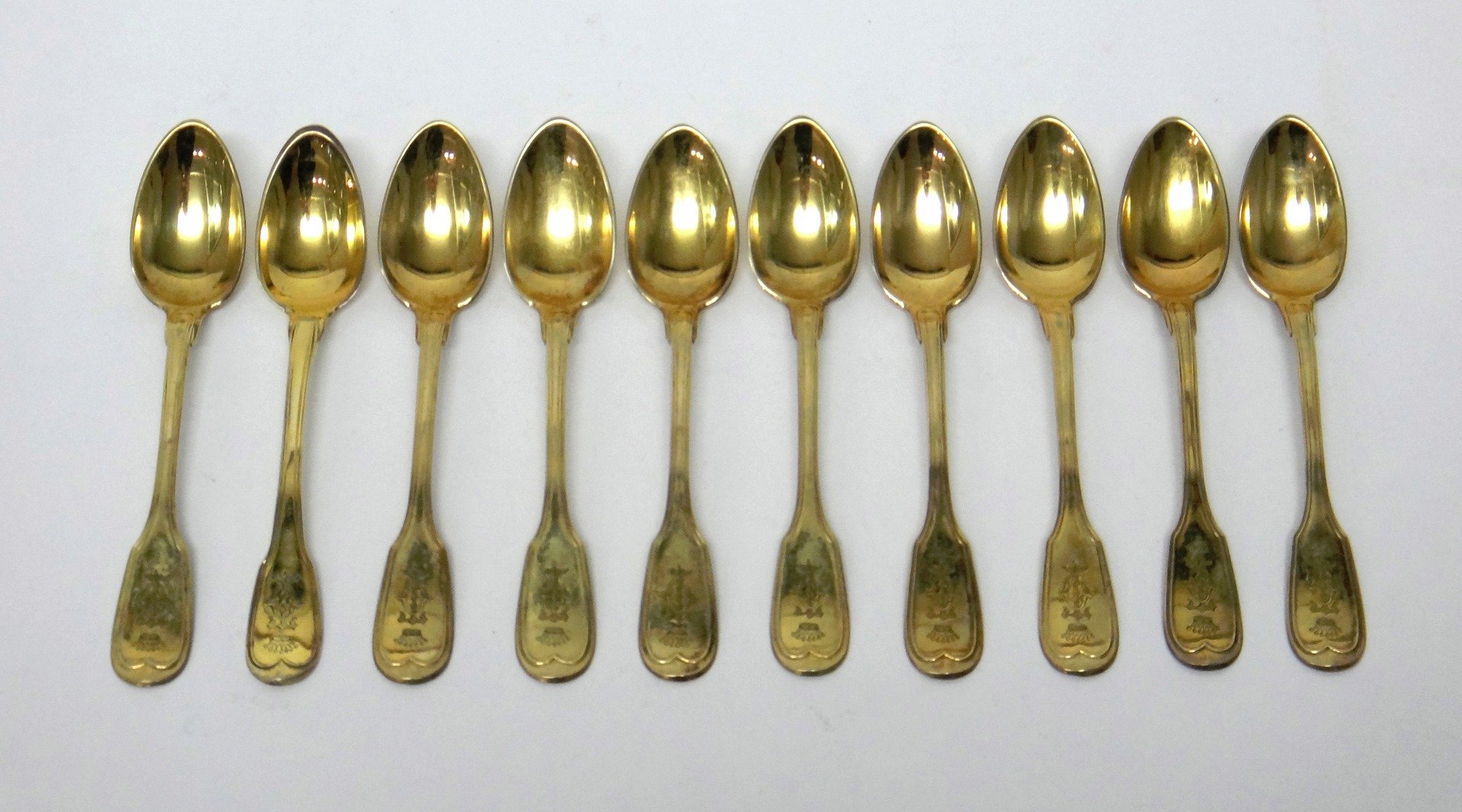 Appraisal: One French silver gilt teaspoon in a stylised fiddle and