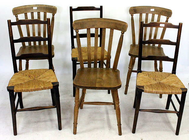 Appraisal: A SET OF THREE RUSH SEATED KITCHEN CHAIRS and a