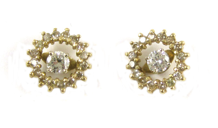 Appraisal: PAIR OF DIAMOND EAR STUDS WITH EARRING ENHANCERS each k