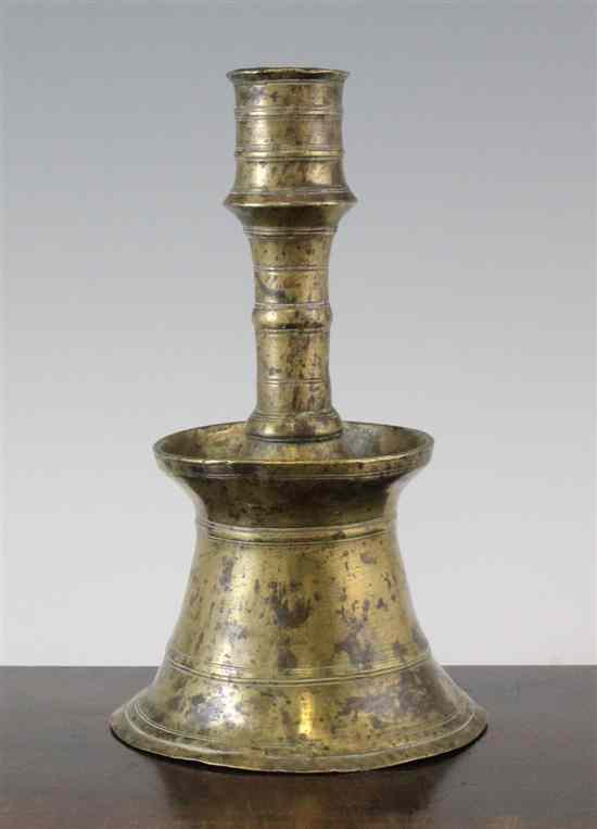 Appraisal: A th century Ottoman brass candlestick with ring decorated column