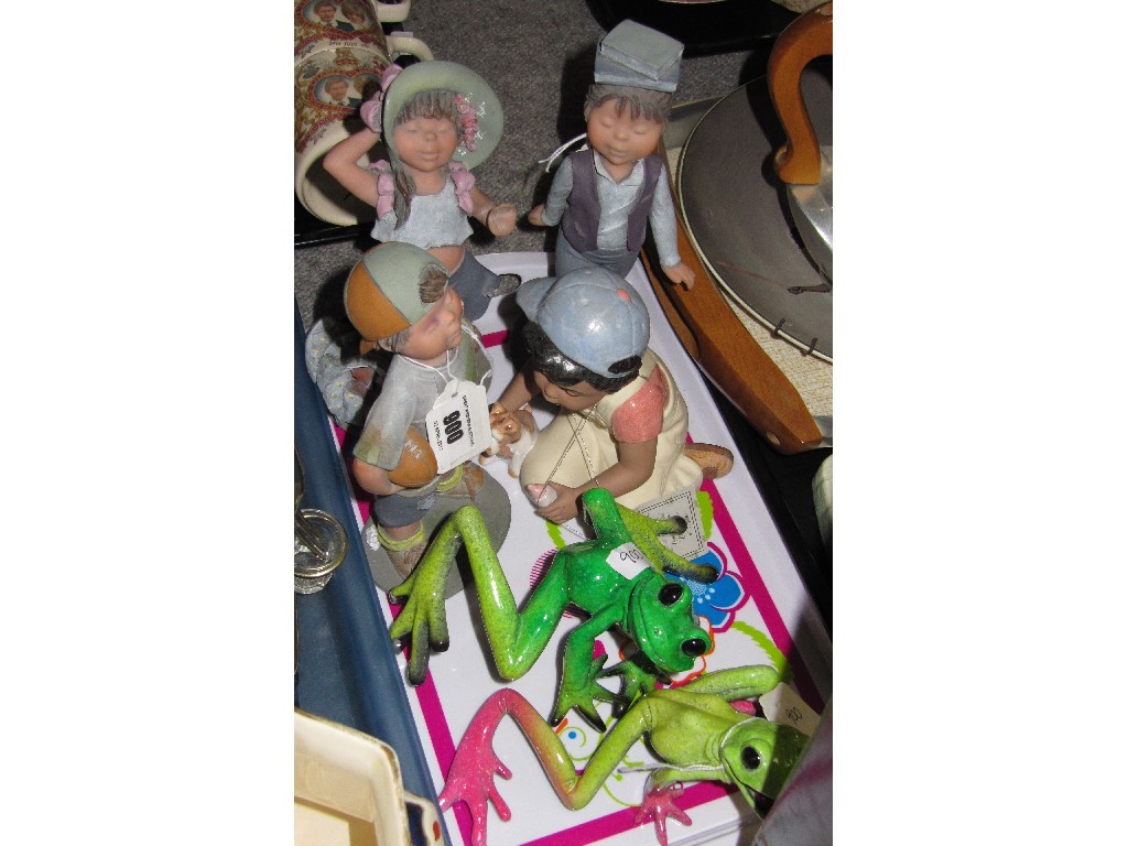 Appraisal: Four resin figures of children and two figures of frogs