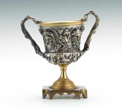 Appraisal: A Gilt and Silvered Bronze Chalice Double handled urn shape