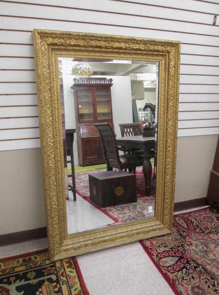 Appraisal: A LARGE GOLD FRAME WALL MIRROR American late th early