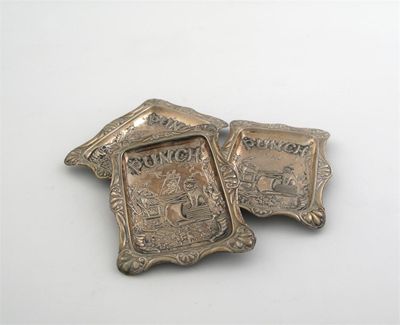 Appraisal: A set of three late Victorian novelty pin trays stamped