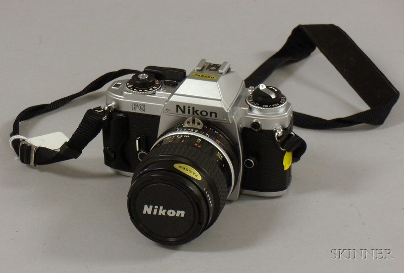 Appraisal: Nikon FG mm SLR Camera with mm Nikkor Lens Strap