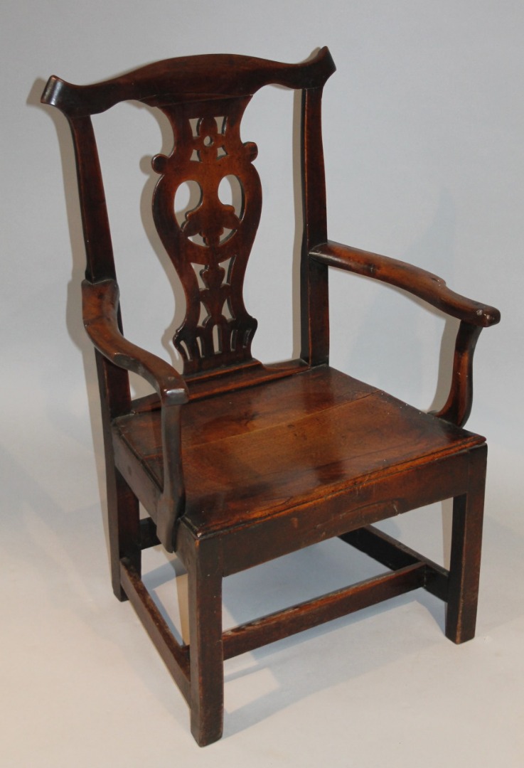 Appraisal: An thC Chippendale design country chair with a comb topped