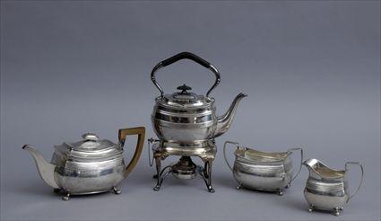 Appraisal: GEORGE III SILVER THREE-PIECE TEA SET AND A SILVER-SOLDERED KETTLE