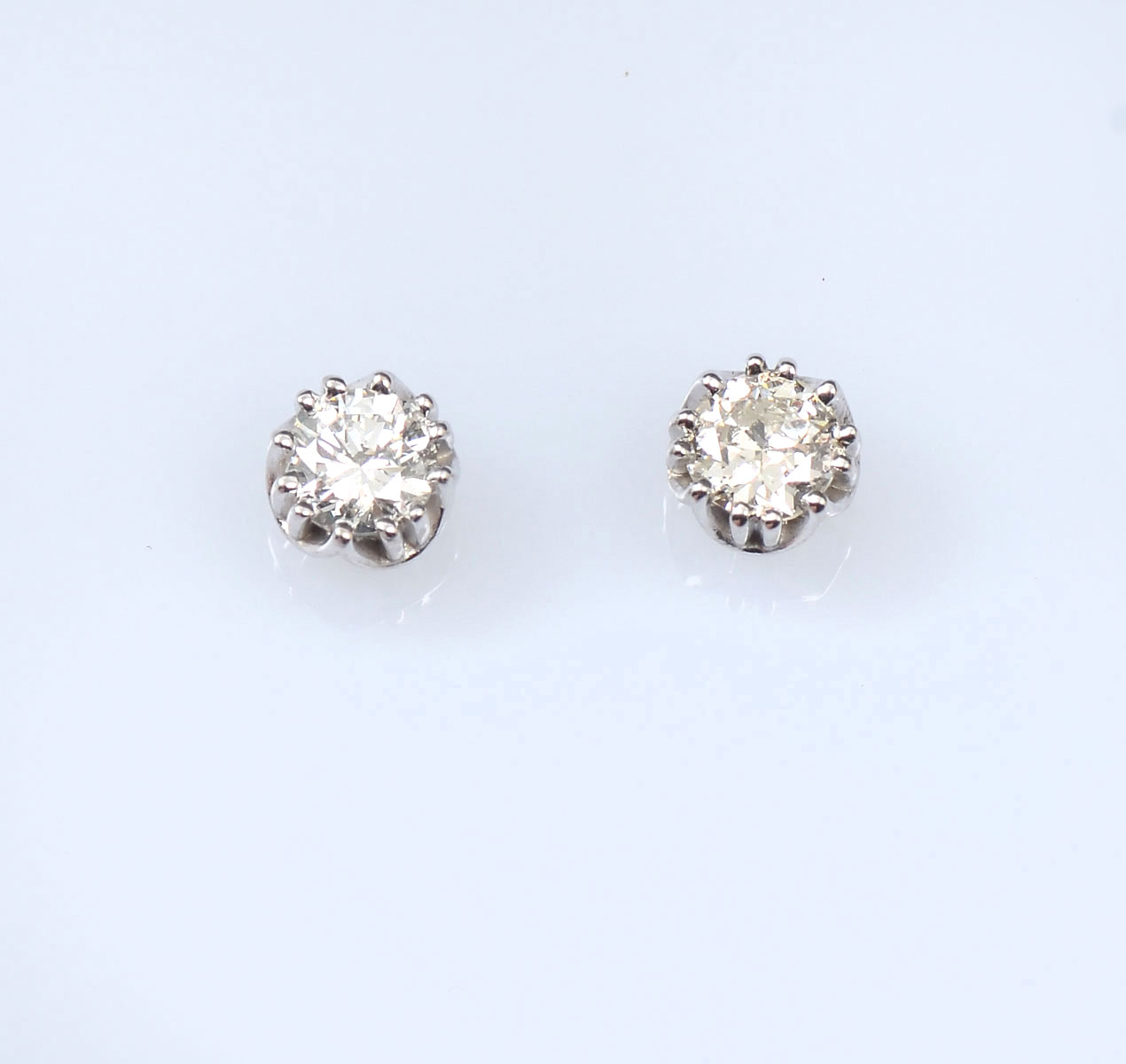 Appraisal: K DIAMOND STUDS round brilliant cut diamonds approx CTW are