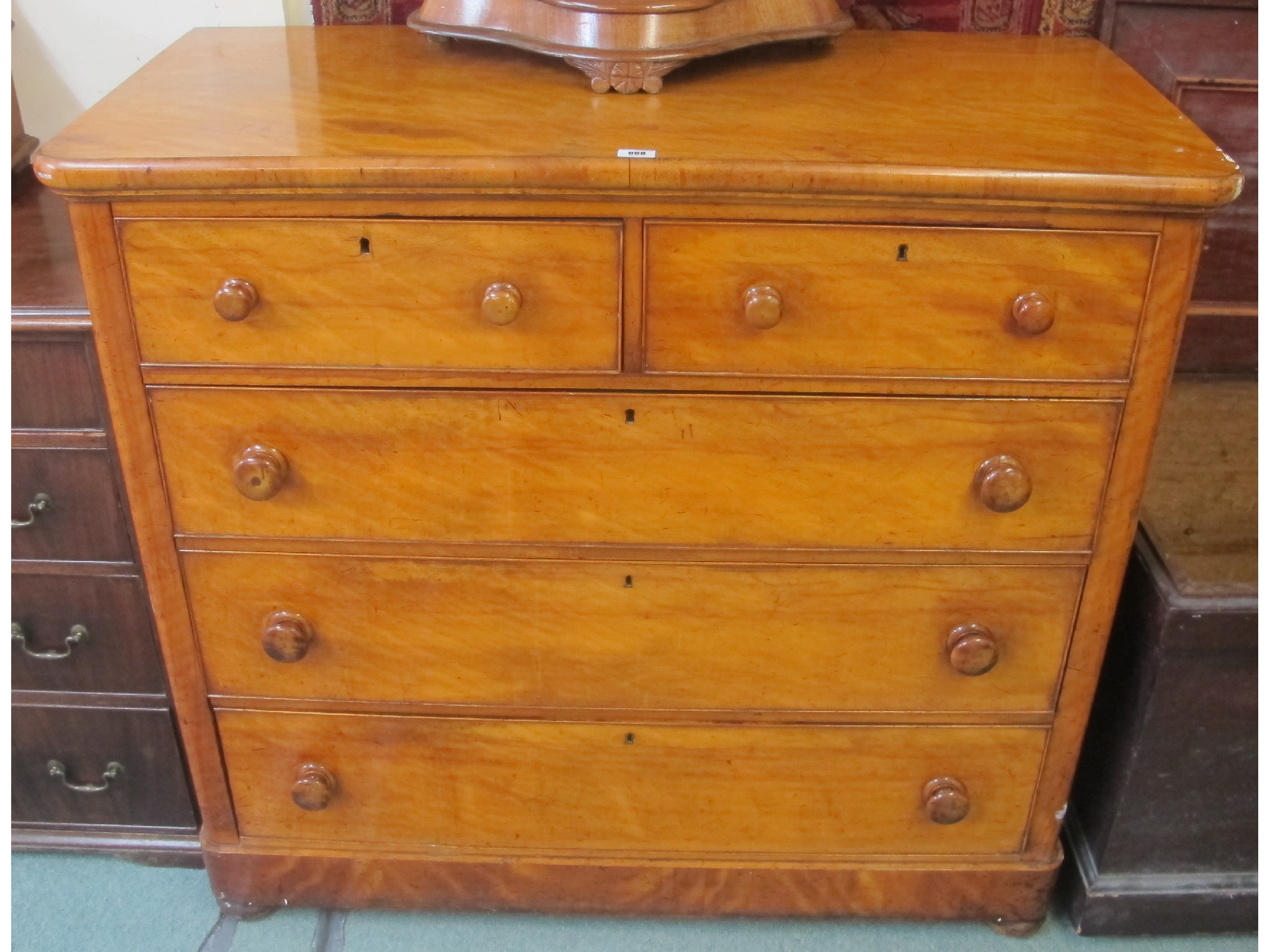 Appraisal: A Victorian satin birch two over three chest of drawers