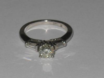 Appraisal: A SOLITAIRE DIAMOND RING the brilliant cut diamond approximately cts