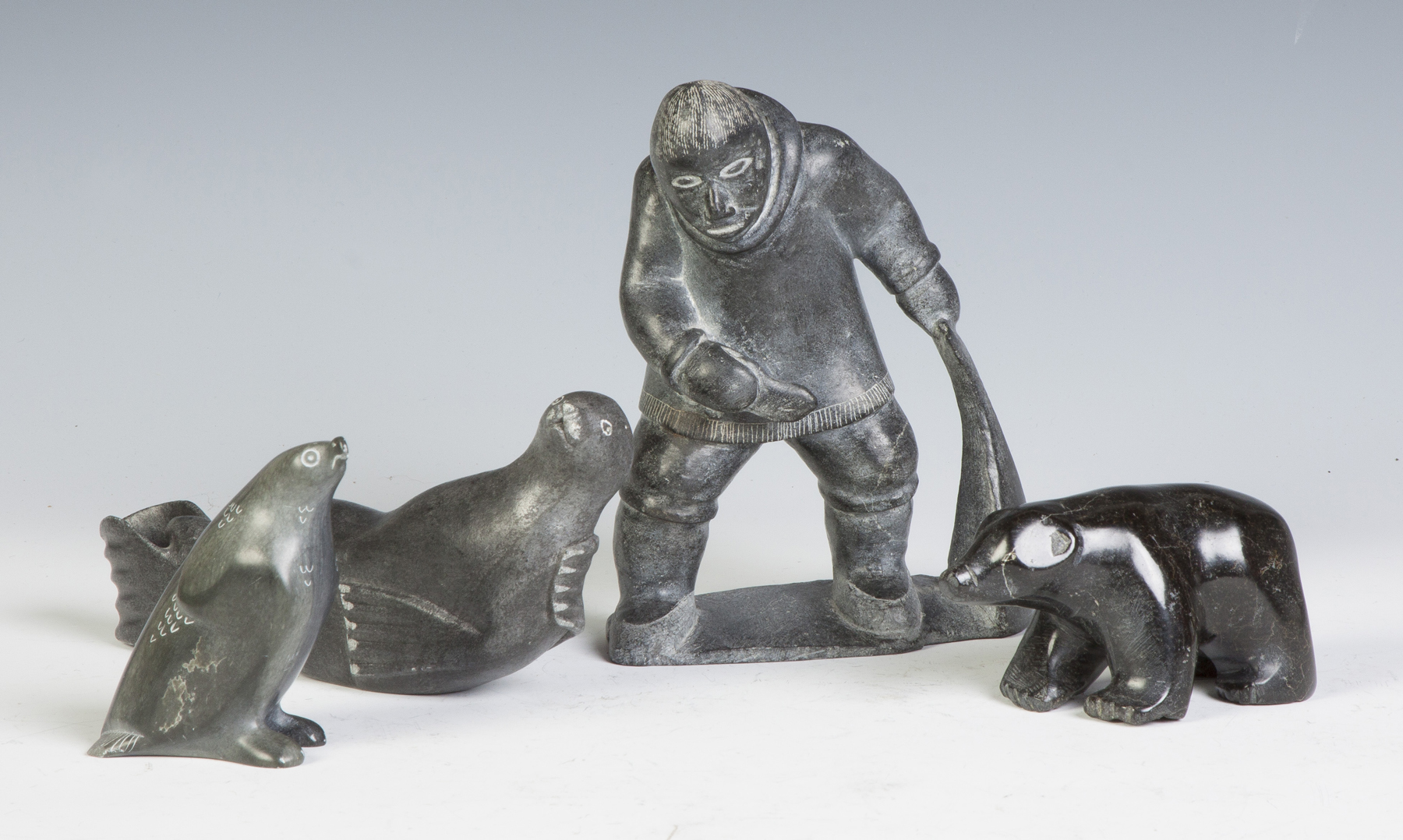 Appraisal: Group of Inuit Art Seals bear fisherman