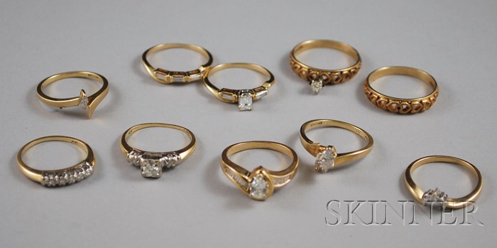 Appraisal: Five kt Gold and Diamond Solitaire Rings with Accompanying Bands