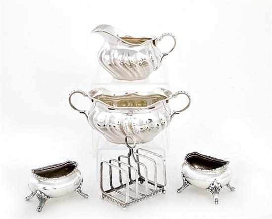 Appraisal: American sterling creamer set salts and toast rack late th