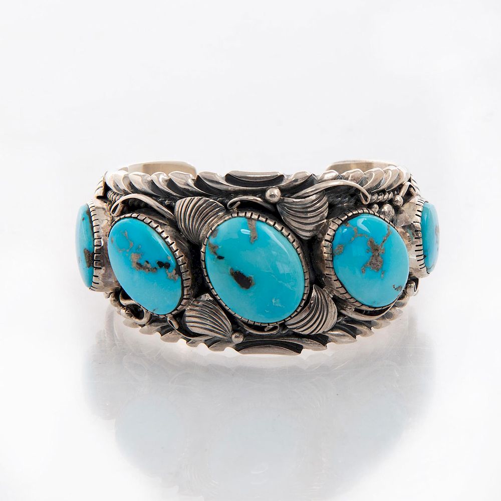 Appraisal: NAVAJO TURQUOISE SILVER BRACELET Cuff bracelet with inset turquoise stones