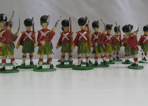 Appraisal: A GROUP OF ENGLISH PAINTED METAL TOY SOLDIERS in assorted