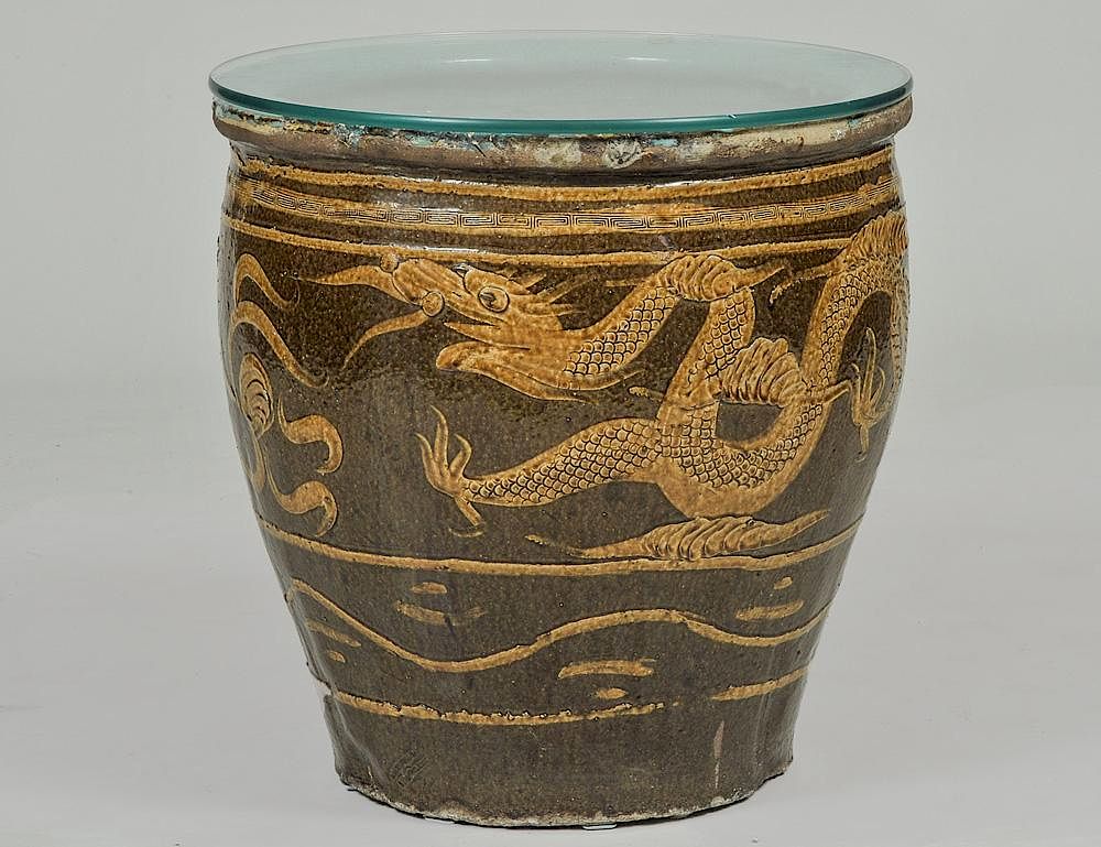 Appraisal: BROWN GLAZED POTTERY JARDINIERE Chinese With dragon motif Diameter With