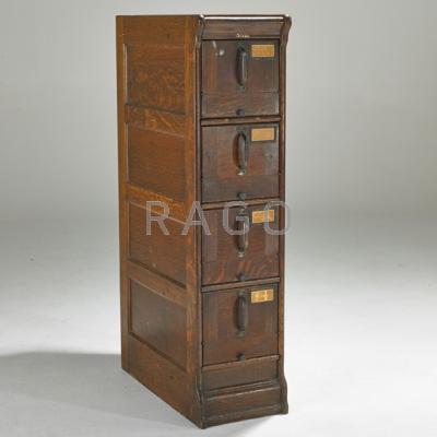 Appraisal: GLOBE Oak four-drawer file cabinet USA ca s Oak and