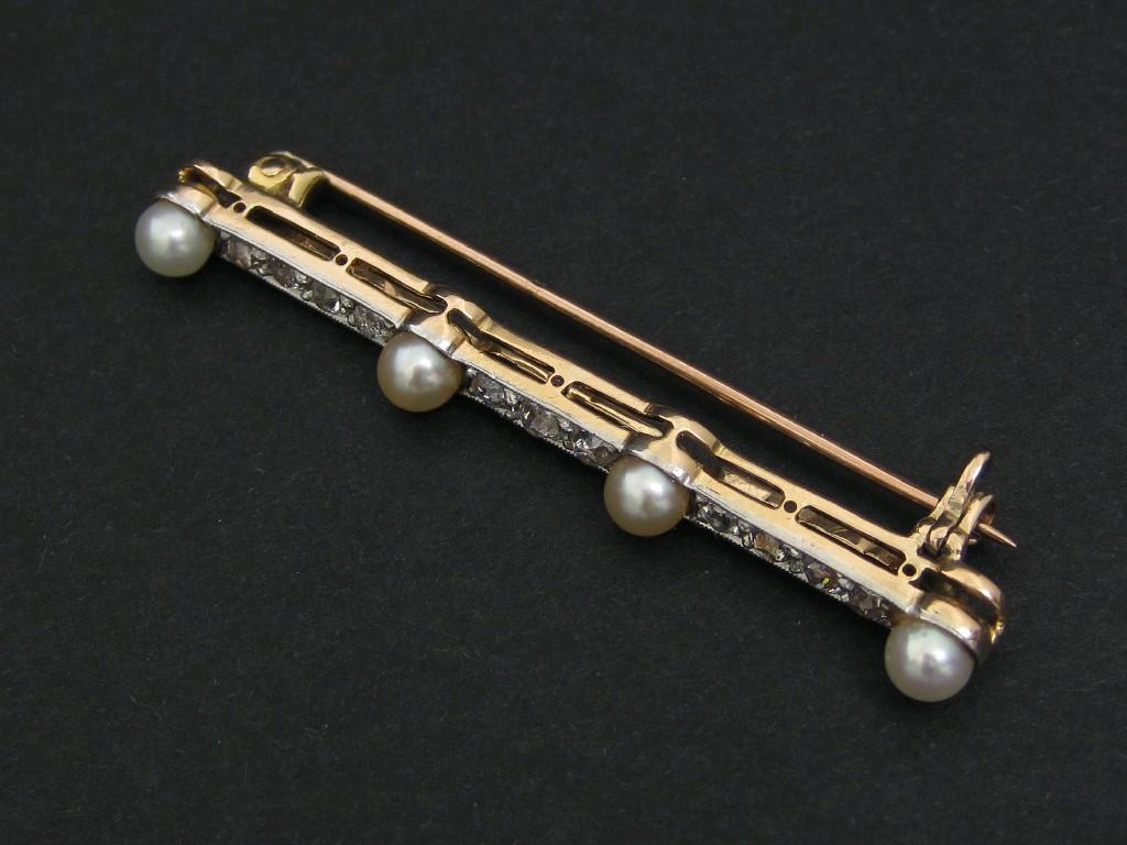 Appraisal: A Diamond and cultured Pearl Bar Brooch pav -set eleven