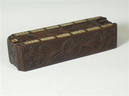 Appraisal: A th century ornate carved wood and inlaid bone cribbage