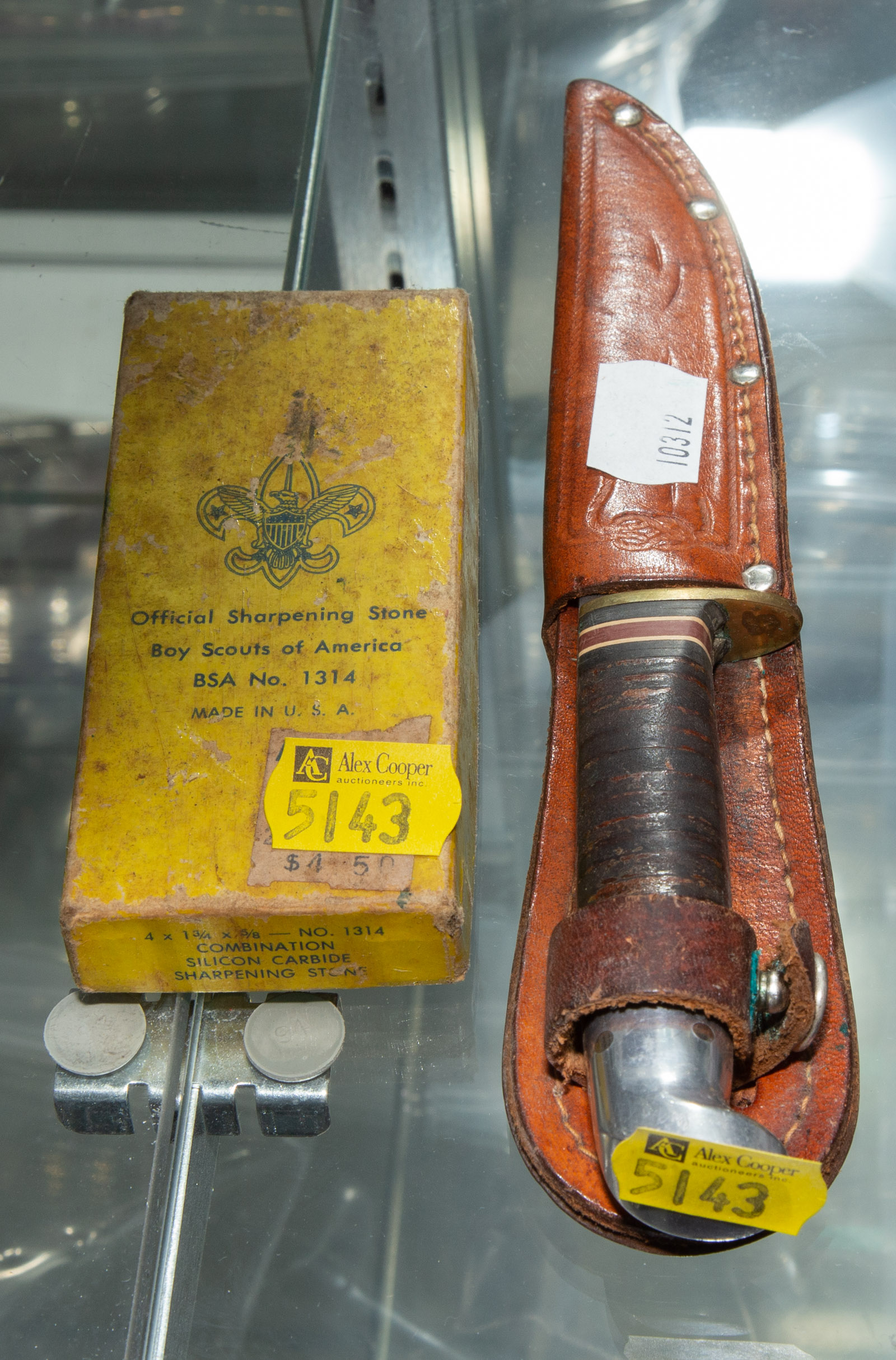 Appraisal: TWO VINTAGE BOY SCOUT ITEMS Includes Western fixed blade knife