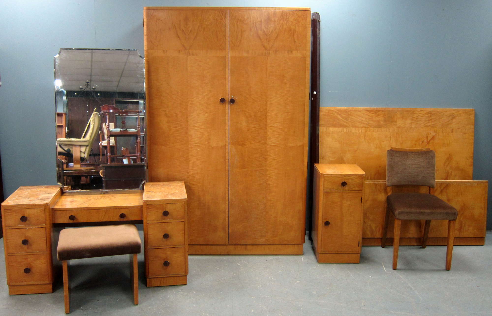 Appraisal: Art Deco Sycamore bedroom suite with rosewood handles comprising two